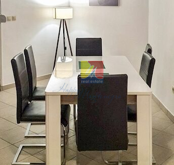 dining table with chairs around and a floor lamp