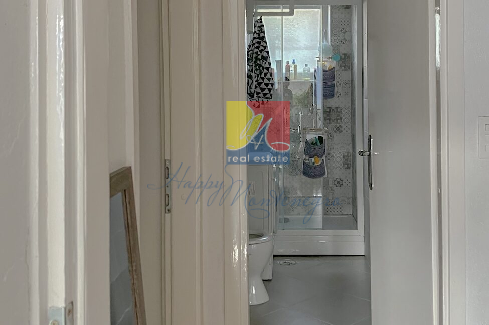 happymontenegro.real.estate.apartment.for.sale.herceg.novi.bathroom.door