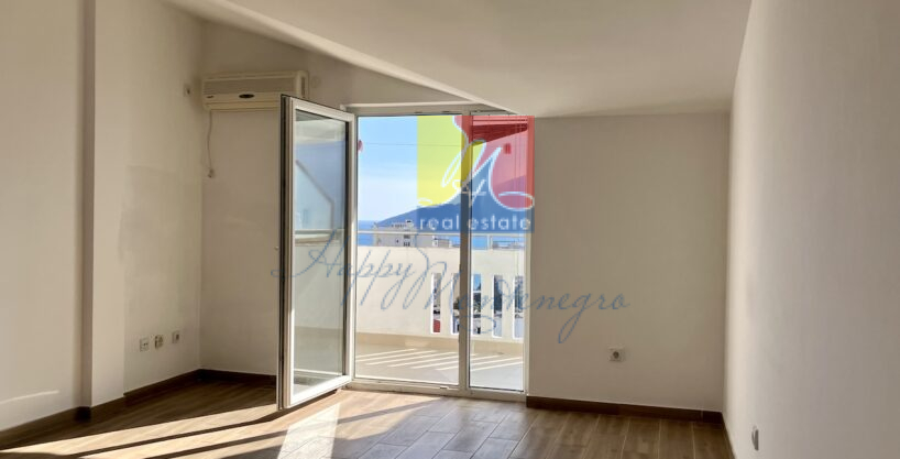 unfurnished room with a sea view